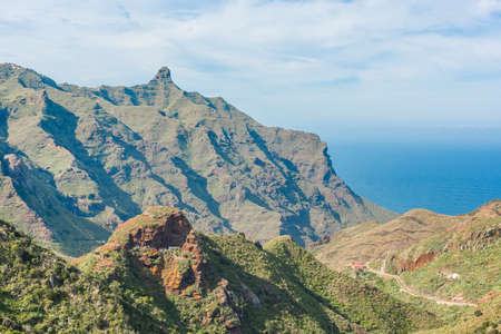 Mountain range on the ocean coastの写真素材