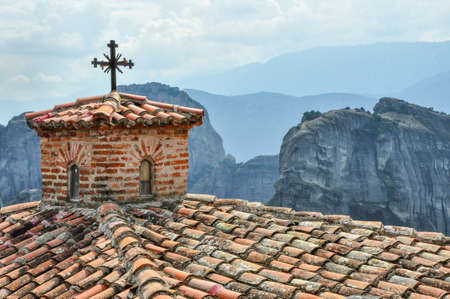 Orthodox cross on a background of mountainsの写真素材