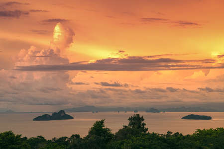 Landscape with beautiful sunset and fiery clouds in the Adaman Sea on Phi Phi Island. Thailandの写真素材