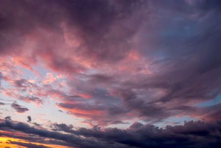 Beautiful sunset sky with thunderstorm cloudsの写真素材