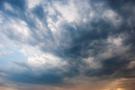 Beautiful storm clouds against the backdrop of sunset skies.の写真素材
