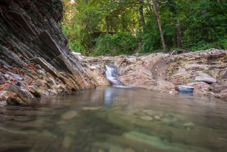 Autumn landscape. Cascades of small waterfalls of the mountain river. Jane River. Krasnodar Territory.の写真素材