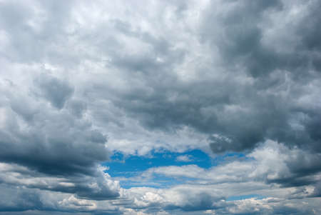 Blue sky background with tiny clouds.の写真素材