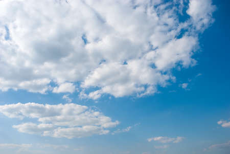 Blue sky background with tiny clouds.の写真素材