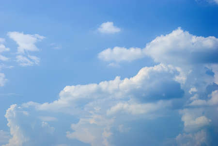 Blue sky background with tiny clouds.の写真素材