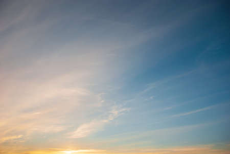 Evening sunset with beautiful clouds and sky.の写真素材