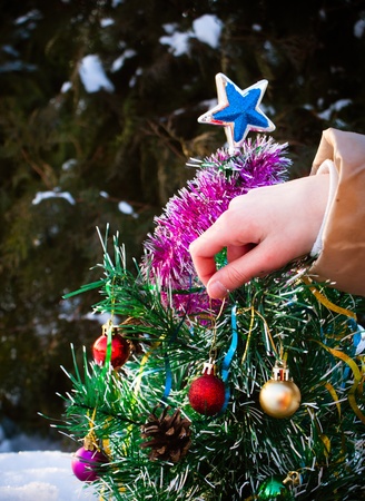 Decorating Christmas treeの写真素材