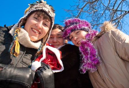 Girls holding a bag with Christmas presents