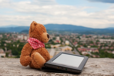 Electronic book reader laying outdoorsの写真素材