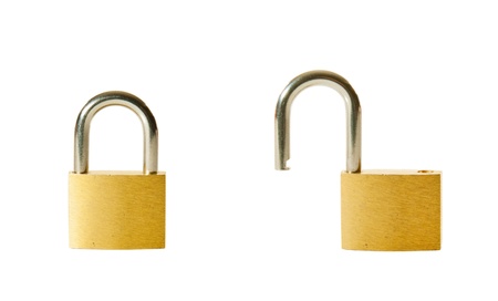 Set of two locked and unlocked locks isolated on white