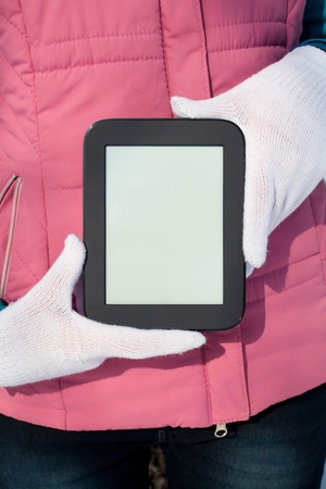 Woman's hands holding electronic book readerの写真素材