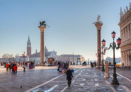 VENICE - DECEMBER 11: Piazza San Marco with tourists on December 11, 2012 in Venice. It's the principal public square of Venice, Italy, where it is generally known just as "the Piazza".のeditorial素材
