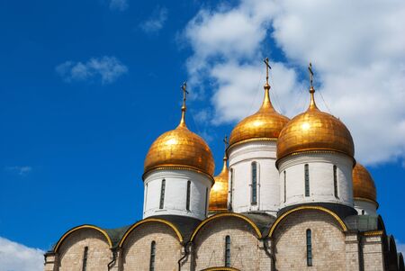 Dormition Cathedral domes at Moscow Kremlin on a sunny dayの写真素材