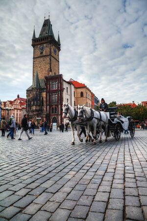 PRAGUE - OCTOBER 09: Old Town Square with tourists on October 09, 2012 in Prague. Old Town Square is a historic square in the Old Town quarter of Prague in the Czech Republic.のeditorial素材