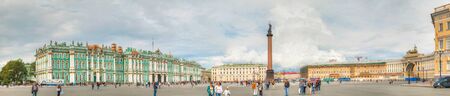 SAINT PETERSBURG, RUSSIA - AUGUST 25: The Alexander Column at Palace (Dvortsovaya) Square in St. Petersburg, Russia on August 25, 2012 with tourists. The monument was erected after the Russian victory in the war with Napoleon's France.のeditorial素材
