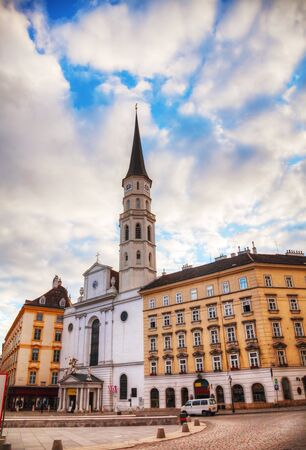 St. Michael's Church (Michaelerkirche) in Vienna at sunriseの写真素材