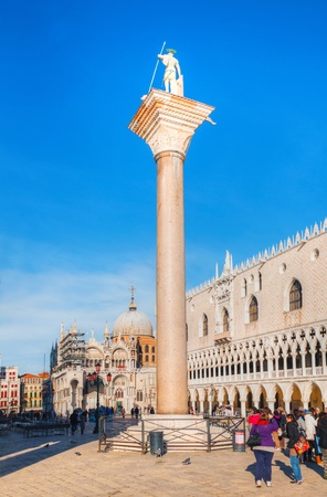 VENICE - DECEMBER 11: Piazza San Marco with tourists on December 11, 2012 in Venice. It's the principal public square of Venice, Italy, where it is generally known just as "the Piazza".のeditorial素材