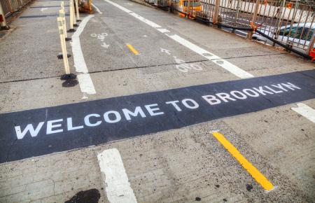 Welcome to Brooklyn sign at the Brooklyn bridge in New Yorkの写真素材
