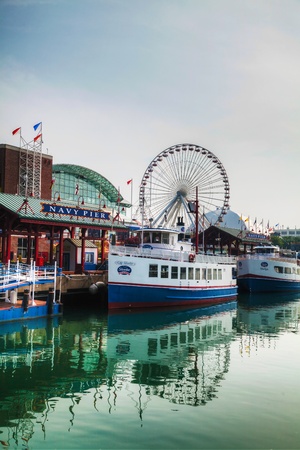 CHICAGO - MAY 19: Navy Pier on May 19, 2013 in Chicago, IL. It's is a 3,300-foot (1,010 m) long pier on the Chicago shoreline of Lake Michigan. Navy Pier is Chicago's number one tourist attraction.のeditorial素材