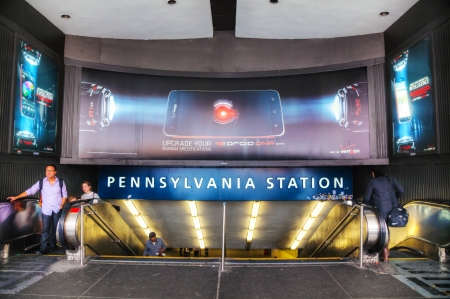 NEW YORK CITY - MAY 11: Entrance to Penn station with people on May 11, 2013 in New York City. Pennsylvania Station, also known as New York Penn Station or just Penn Station, is a major intercity train station and a major commuter rail hub in New York Citのeditorial素材