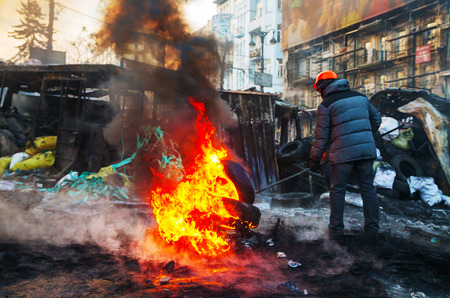 KIEV, UKRAINE - JANUARY 24  Protester at Hrushevskogo street on January 24, 2014 in Kiev, Ukraine  The anti-governmental protests turned into violent clashes during last week  のeditorial素材