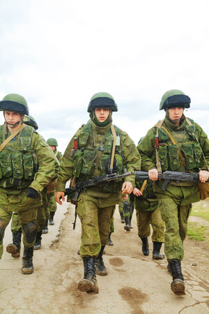 PEREVALNE, UKRAINE - MARCH 5  Russian soldiers marching on March 5, 2014 in Perevalne, Crimea,...