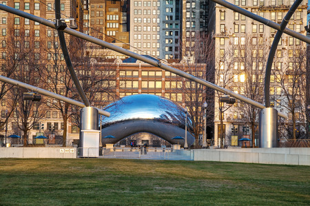 CHICAGO - APRIL 10: Cloud Gate sculpture in Millenium park on April 10, 2014 in Chicago, IL. This public sculpture is the centerpiece of the AT&T Plaza in Millennium Park within the Loop community area.のeditorial素材