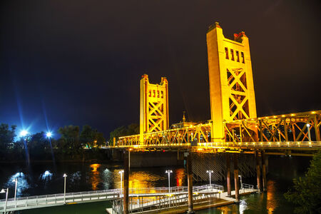 Golden Gates drawbridge in Sacramento at the night timeの写真素材