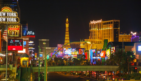LAS VEGAS - APRIL 18: Las Vegas boulevard in the night on April 18, 2014 in Las Vegas, Nevada. It's the most populous city in the state of Nevada and the county seat of Clark County.のeditorial素材