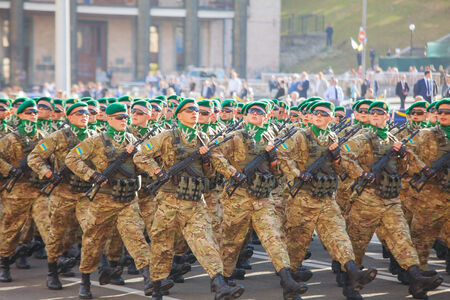 KYIV, UKRAINE - AUGUST 24: Border guard troopers of the Ukrainian Army at the military parade dedicated to the Independence Day of Ukraine on August 24, 2014 in Kyiv, Ukraine. These guys take a part in the anti-terrorists operation in Donbass.のeditorial素材