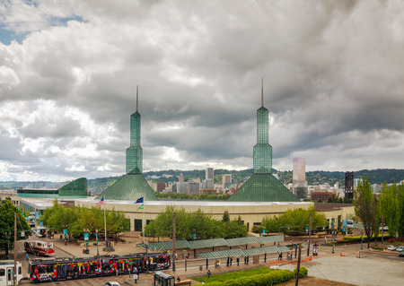 PORTLAND - MAY 5: Oregon convention center on May 5, 2014 in Portland, Oregon. Completed in 1989 and opened in 1990, it located on the east side of the Willamette River in the Lloyd District neighborhood.のeditorial素材
