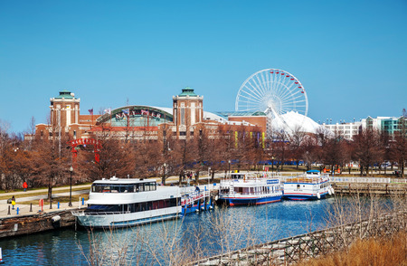 CHICAGO - APRIL 9: Navy Pier on April 9, 2014 in Chicago, IL. It's is a 3,300-foot (1,010 m) long pier on the Chicago shoreline of Lake Michigan. Navy Pier is Chicago's number one tourist attraction.のeditorial素材