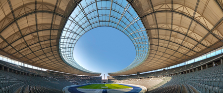 BERLIN - OCTOBER 5, 2014: Olimpic stadium interior on October 5, 2014 in Berlin, Germany. It's the second biggest stadium in Germany behind Signal Iduna Park.のeditorial素材
