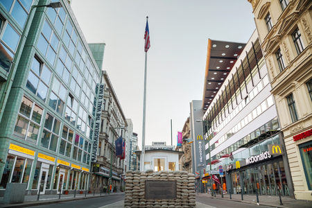 BERLIN - OCTOBER 5, 2014: Checkpoint Charlie on October 5, 2014 in Berlin, Germany. The name was given by the Western Allies to the best-known Berlin Wall crossing point between East and West Berlin during the Cold War.のeditorial素材