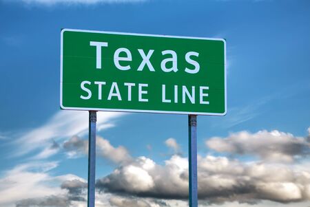 Texas state line sign at the state borderの写真素材
