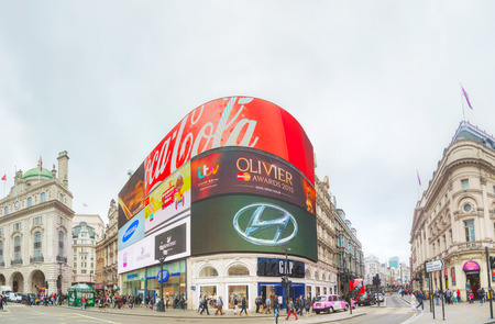 LONDON - APRIL 12: Piccadilly Circus junction early in the morning on April 12, 2015 in London, UK....
