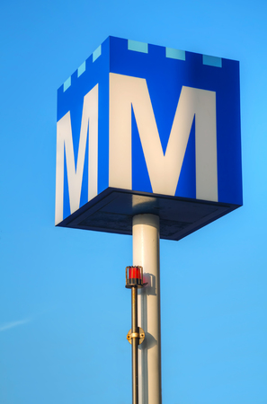 AMSTERDAM - APRIL 15: Amsterdam station sign on April 15, 2015 in Amsterdam, Netherlands. The Amsterdam Metro is a mixed rapid transit and light rail system.のeditorial素材