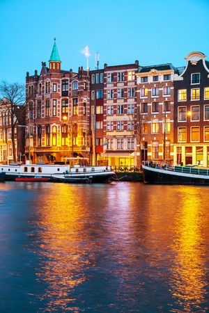 Night city view of Amsterdam, the Netherlands with Amstel riverのeditorial素材