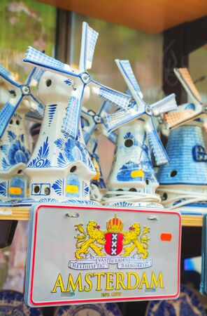 AMSTERDAM - APRIL 17: Wind mill souvenirs at the floating flower market shop on April 17, 2015 in Amsterdam, Netherlands. Itâs usually billed as the âworldâs only floating flower marketâ.のeditorial素材