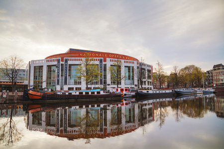 AMSTERDAM - APRIL 17: Nationale opera and ballet building (Stopera) on April 17, 2015 in Amsterdam, Netherlands. The Stopera is located in the center of Amsterdam.のeditorial素材