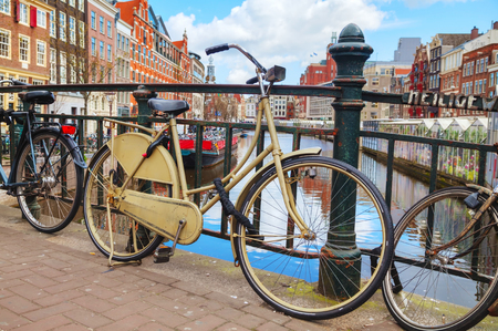 Bicycles parked near the floating flower market in Amsterdam, Netherlandsの写真素材