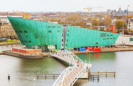 AMSTERDAM - APRIL 16: Science Center Nemo building on April 16, 2015 in Amsterdam, Netherlands. It contains five floors of hands-on science exhibitions and is the largest science center in the Netherlands.のeditorial素材