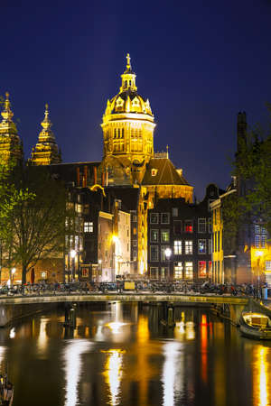 The Basilica of Saint Nicholas (Sint-Nicolaasbasiliek) in Amsterdam at sunsetのeditorial素材