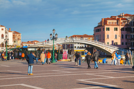 VENICE - NOVEMBER 22: Square near Santa Lucia train staition with tourists on November 22, 2015 in Venice, Italy.のeditorial素材