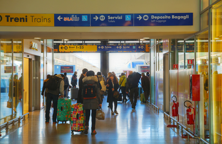 VENICE - NOVEMBER 22: Santa Lucia train station with tourists on November 22, 2015 in Venice, Italy. It's a terminal railway station serving the city of Venice.のeditorial素材