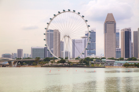Downtown Singapore as seen from the Marina Bay in the eveningのeditorial素材