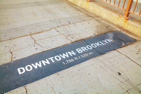 Downtown Brooklyn sign at the Brooklyn bridge in New Yorkの写真素材