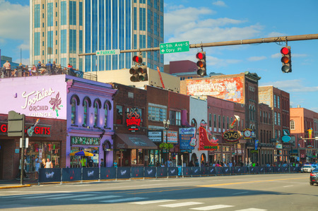 NASHVILLE - AUGUST 28: Downtown Nashville with people on August 28, 2015 in Nashville, TN. Nashville is the capital of the State of Tennessee and the county seat of Davidson County.