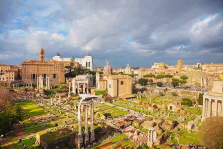 Roman forum ruins on a cloudy day in Rome, Italy