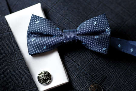 Luxury bow tie close up with vintage suit and cufflink.の写真素材